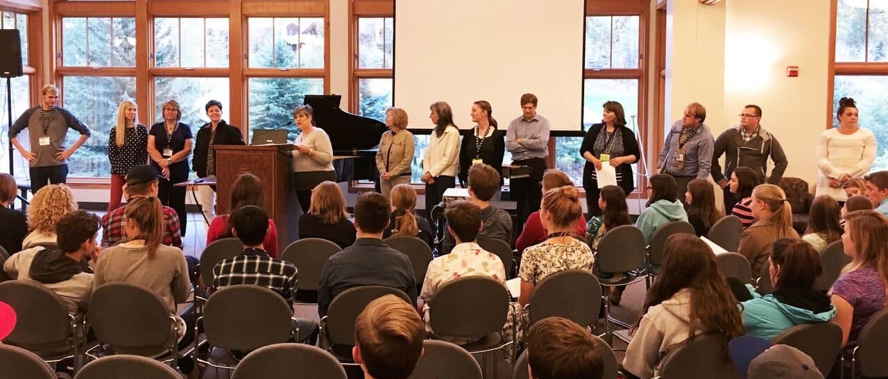 Liahona students gathered at a school assembly